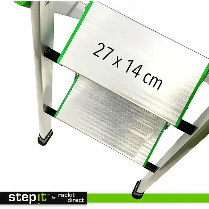 Close-up of StepIt™ ladder tread by Rackit Direct, displaying a detailed anti-slip surface and green-accented edges. Step size marked as 27 x 14 cm. Metal legs with protective rubber feet ensure stability.
